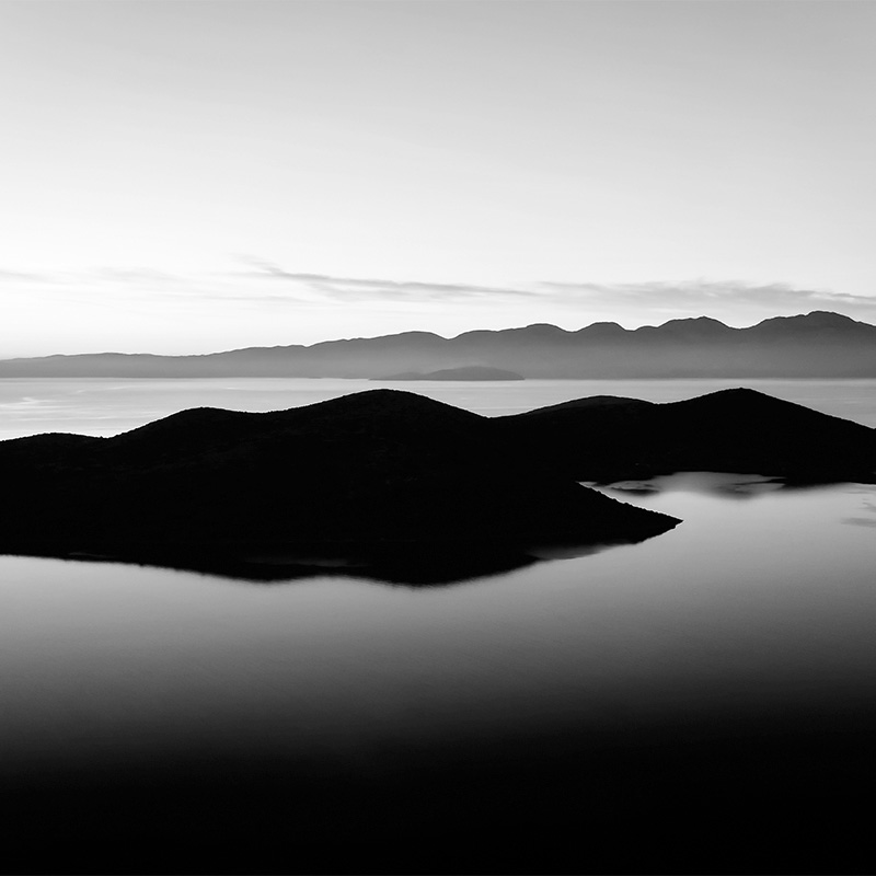 Gray mountains over sea